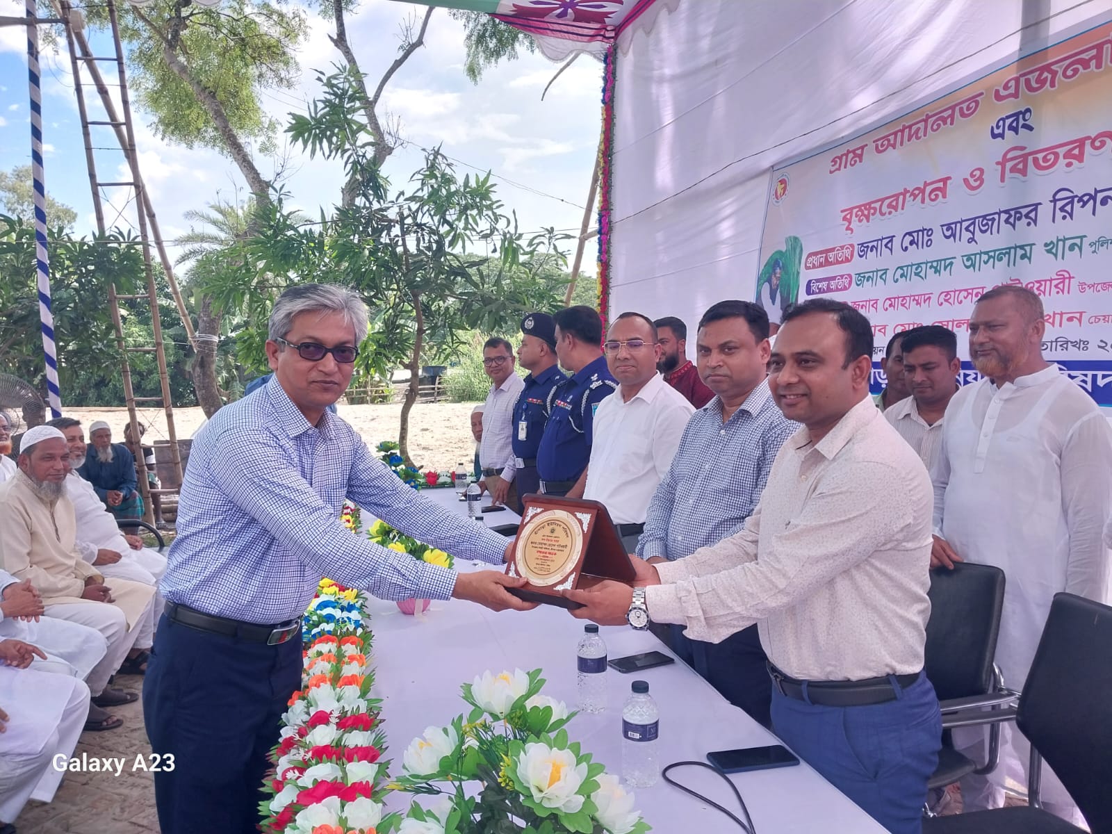 শ্রীনগরে গ্রাম আদালত এজলাস উদ্বোধন এবং গাছ রোপন ও বিতরণ